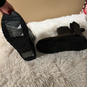 Black leather Ugg with zipper. Brand new never worn.